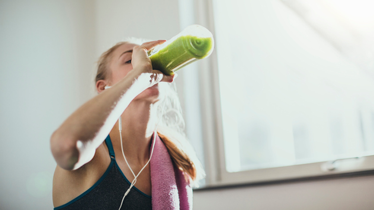 woman drinking healthy drink, protein powder for weight loss - 6 ingredients to look for by healthista.com