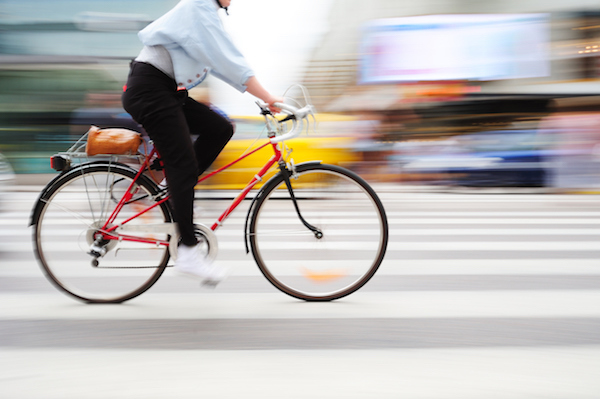 woman-riding-blurred-city-cycle training-plan-made-easy-by-healthista.com-body-image.jpg