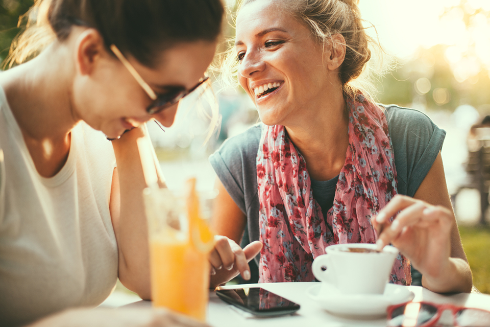 women laughing, how to make friends by healthista