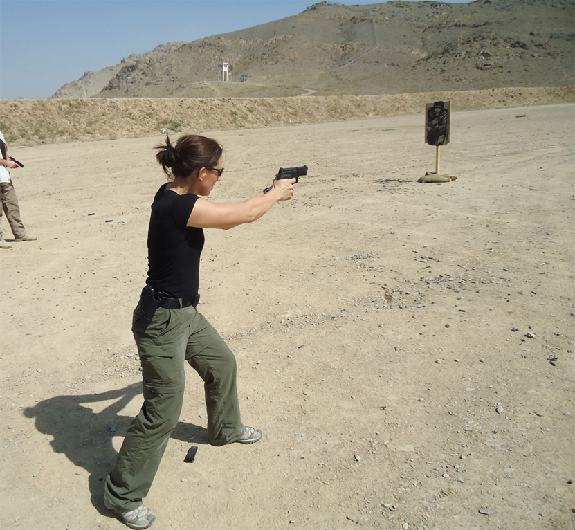 Polly Wilson shooting gun, how does a bodyguard workout by healthista