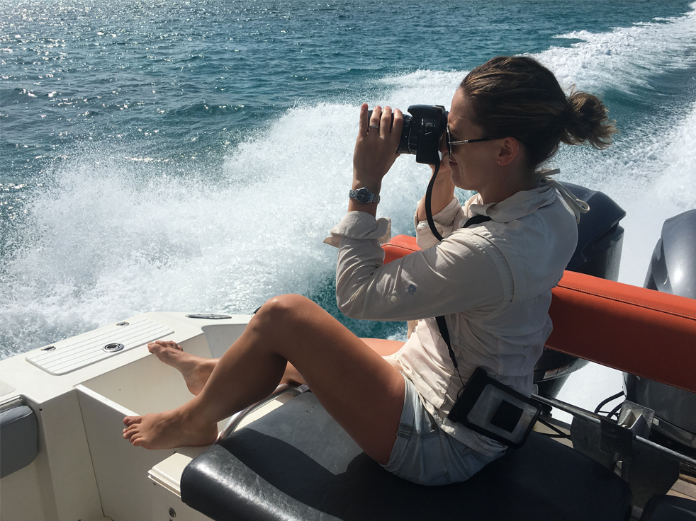 Polly taking photo at sea, how does a bodyguard stay fit by healthista