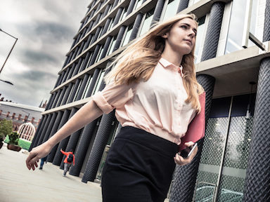 Woman walking Just one in ten people would tell their boss about a mental illness - How to look after your mental health at work Healthista featured