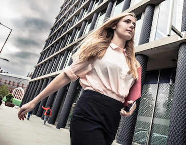 Woman walking Just one in ten people would tell their boss about a mental illness - How to look after your mental health at work Healthista featured