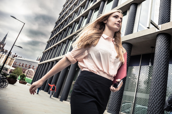 Woman walking Just one in ten people would tell their boss about a mental illness - How to look after your mental health at work Healthista