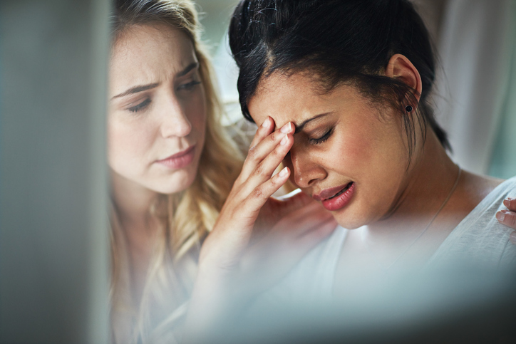 comforting-woman-crying-at-work-yes-or-no-by-healthista.com_