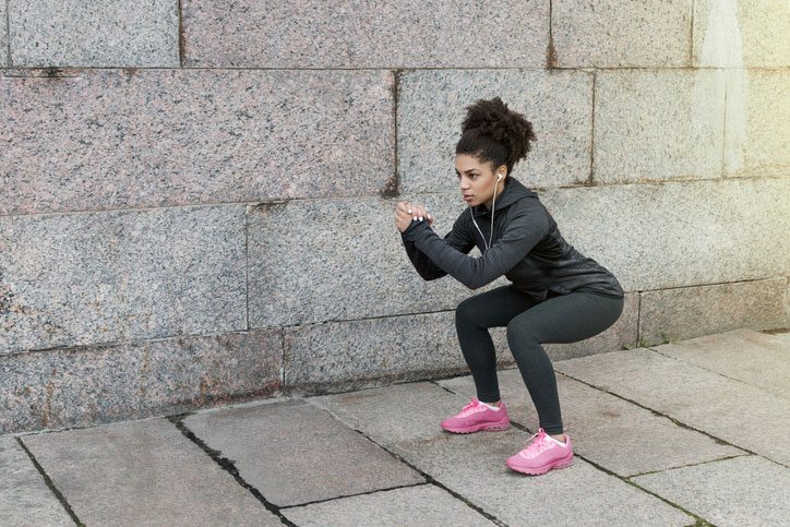 woman squatting, best pelvic floor exercises that will spice up your sex life by healthista