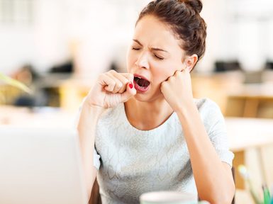 woman-yawning-symptoms-of-vitamin-D-deficiency-by-Healthista