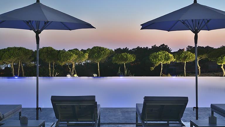 The-Oitavos-Exterior-Pool-at-sunset-spa-review-healthista