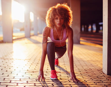 woman-doing-stretches,-world's-greatest-stretch,-what-works-in-the-gym-by-healthista.com