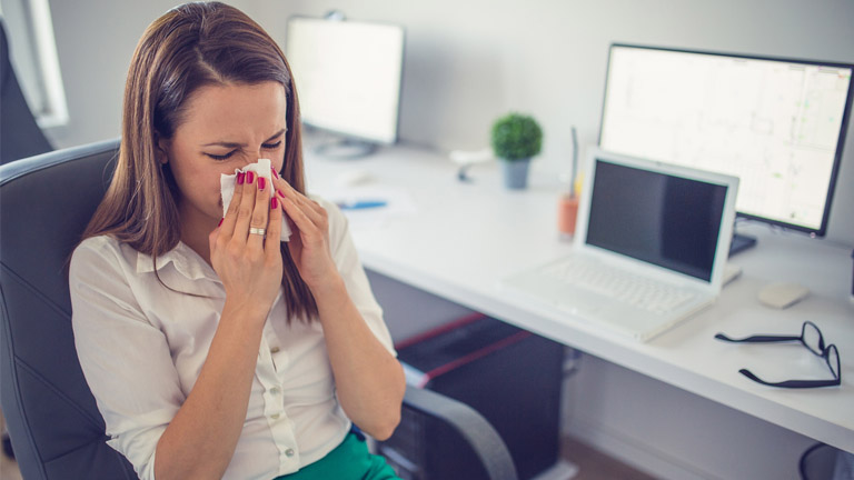 woman sneezing, hay fever, by healthista