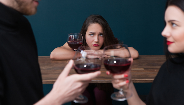 woman-out-looking-sad-out-with-friends-dating-app-healthista.com