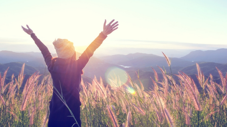 key-to-success-woman-in-meadow