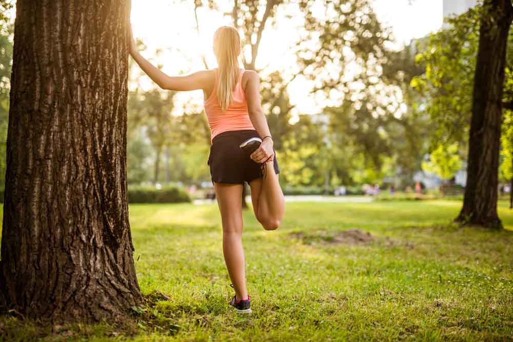 12-tips-to-boost-your-fertility-woman-exercising-outdoors.jpg