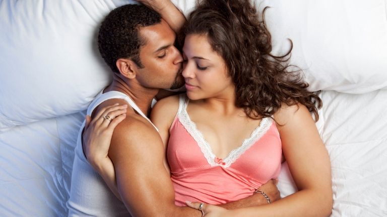 7 ways to use tantric sex to improve your love life - couple cuddling - in post 3