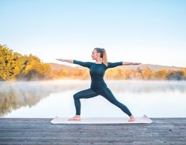 Improve your posture with this 30 minute vinyasa flow routine - warrior pose - featured