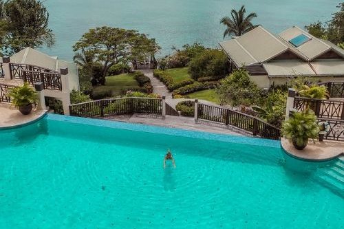 St Lucia resort - blue water and pool