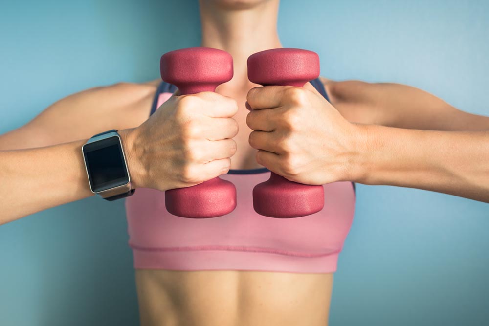 transformation-wk-10-woman-holding-weights.jpg