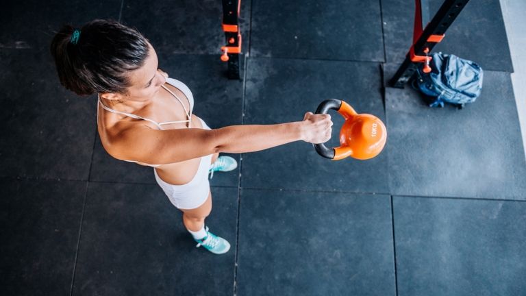 This arm workout using a kettlebell will get you bicep-confident fast