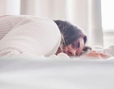 Woman sleeping close up post featured causes of tiredness healthista