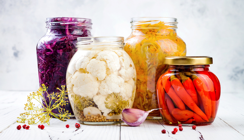 fermented foods in jars in a row Healthista 