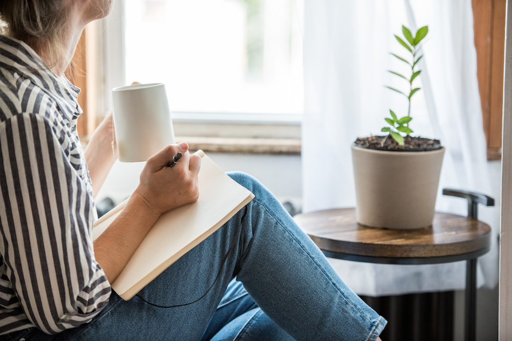 woman-reading-and-writing-stress-anxiety-.jpg