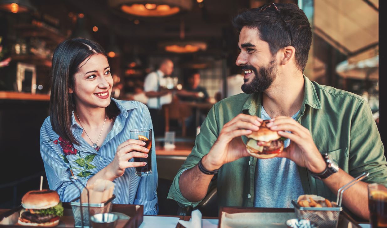 couple eating on first date ice breakers