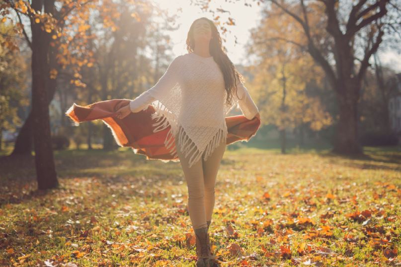 How to combat Seasonal Affective Disorder (SAD) this winter woman walking outside