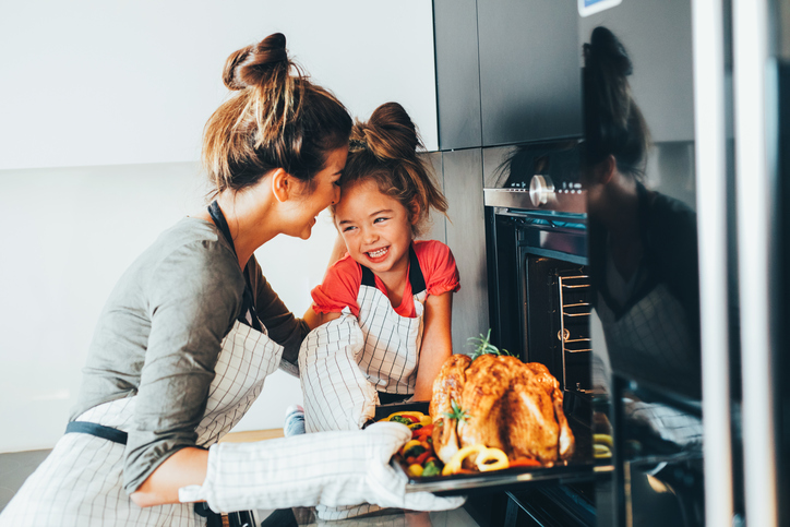 9-helpful-tips-for-a-healthy-happy-Christmas-embrace-the-small-moments-mother-and-daughter-cooking.jpg