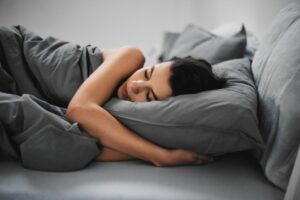 3 ways CBD can make your workouts better woman sleeping