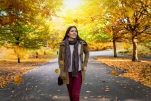 woman getting vitamin D walking outside