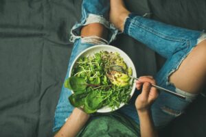 bowl of leafy greens and vegetables eating for menopause