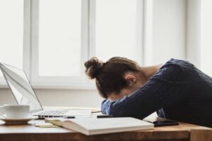 woman exhausted feeling overwhelmed