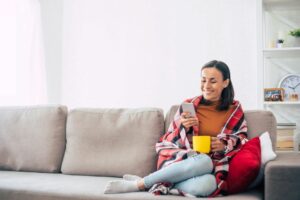 woman relaxing on sofa