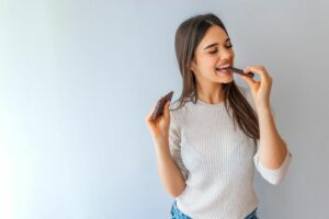 happy woman eating comfort food