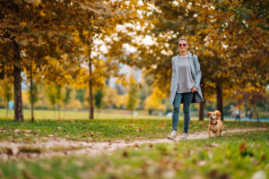 woman-walking-her-dog-move-daily-for-weight-loss-lift-studios-fulham-.jpg