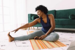 woman stretching after running london marathon inspiration top tips