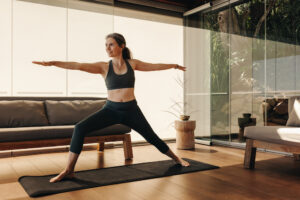 woman-doing-yoga-in-living-room-.jpg 